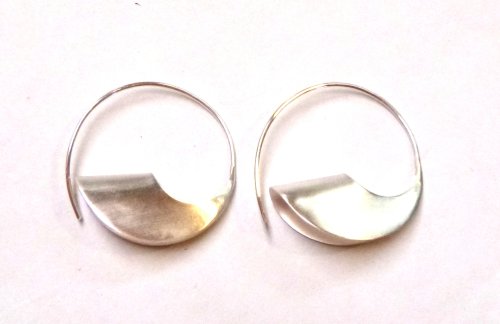 Judy Larson's Disc Cutter Earrings Remodel - , Metalwork, Cutting, Cutting Tool, Cutters, Filing, Finishing, Butane Torch, Soldering, Solder, Hold an earring over a solder block and heat with a butane